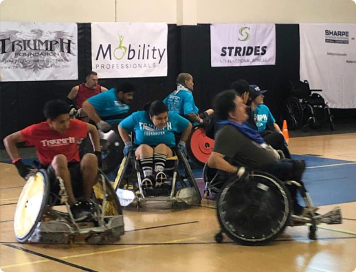 People in wheelchairs playing games