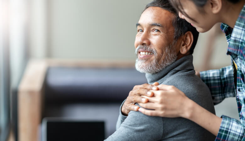 Elderly man being comforted